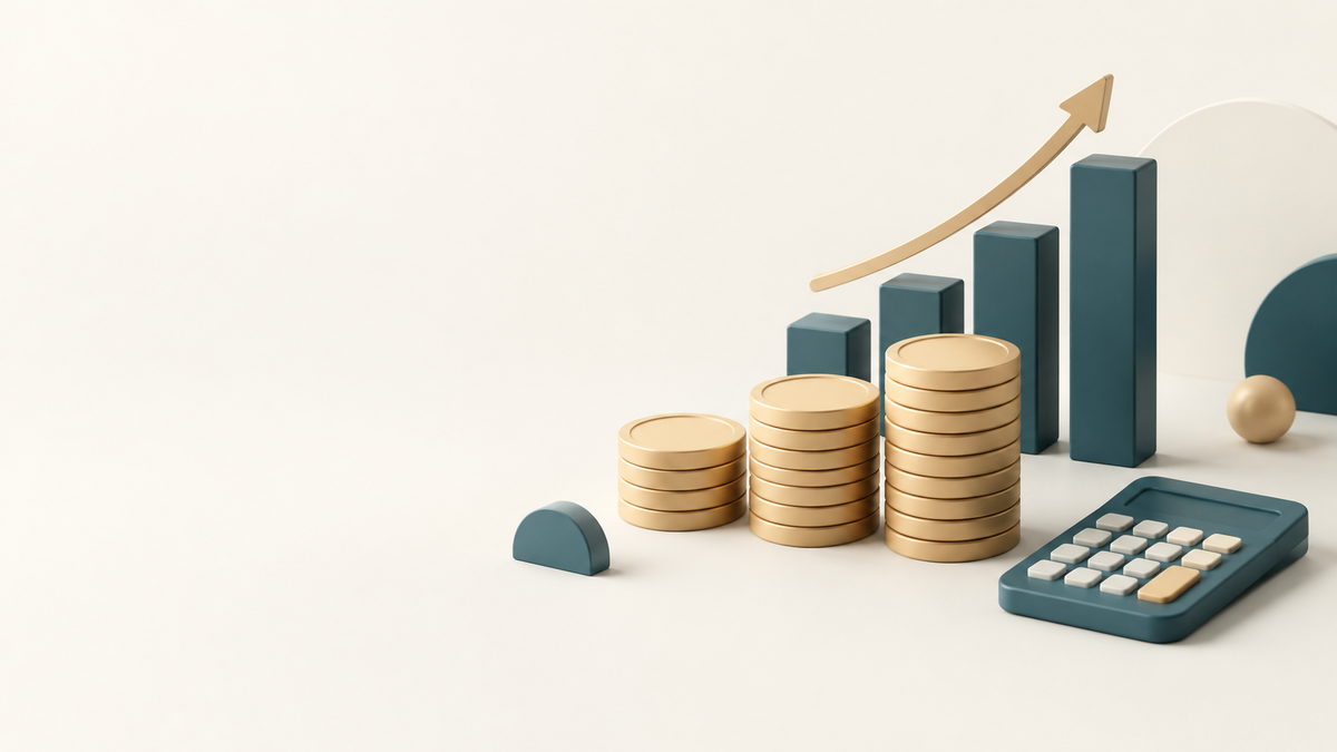 Stacked coins, a rising chart and a calculator